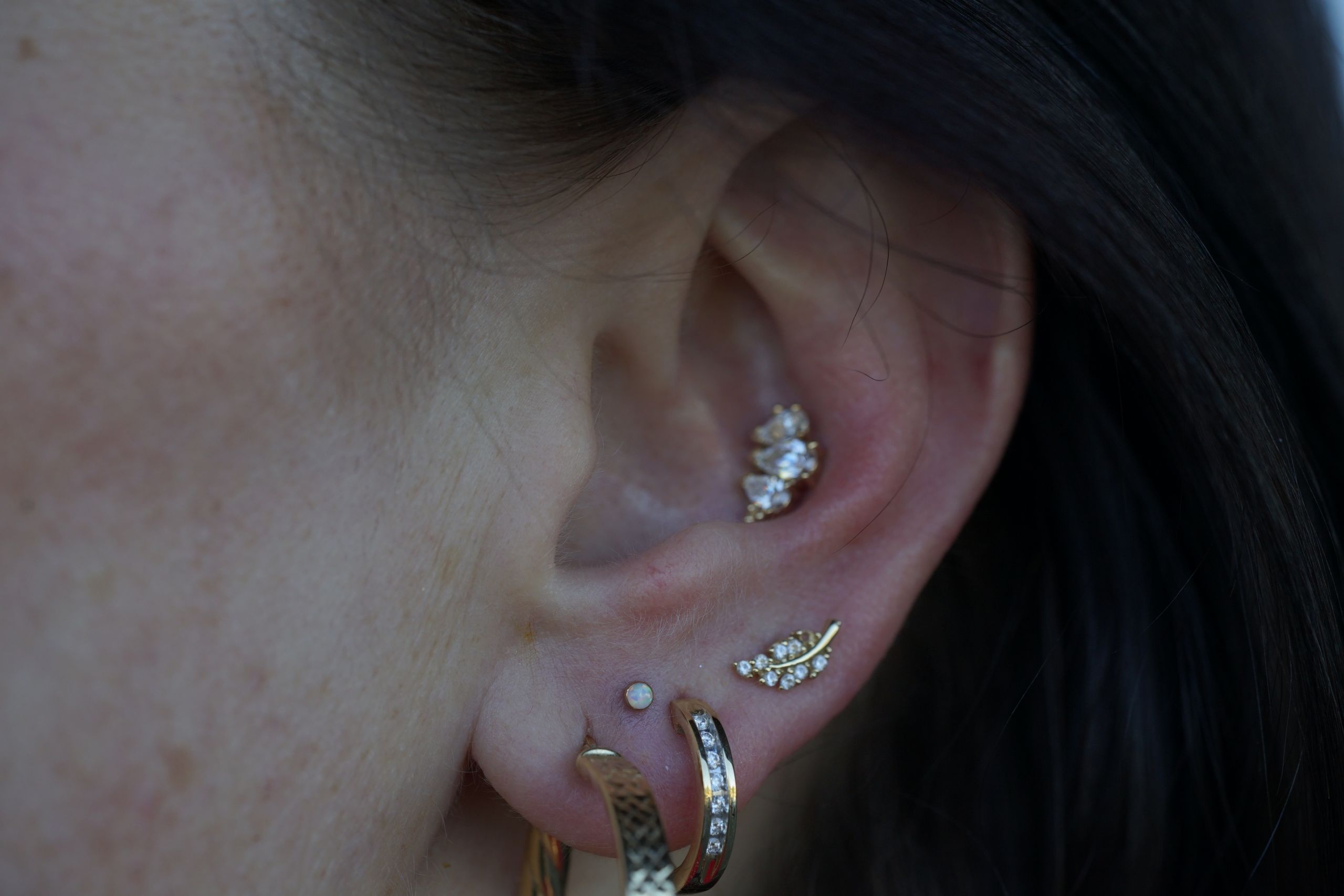 An example of stacked earlobe piercing