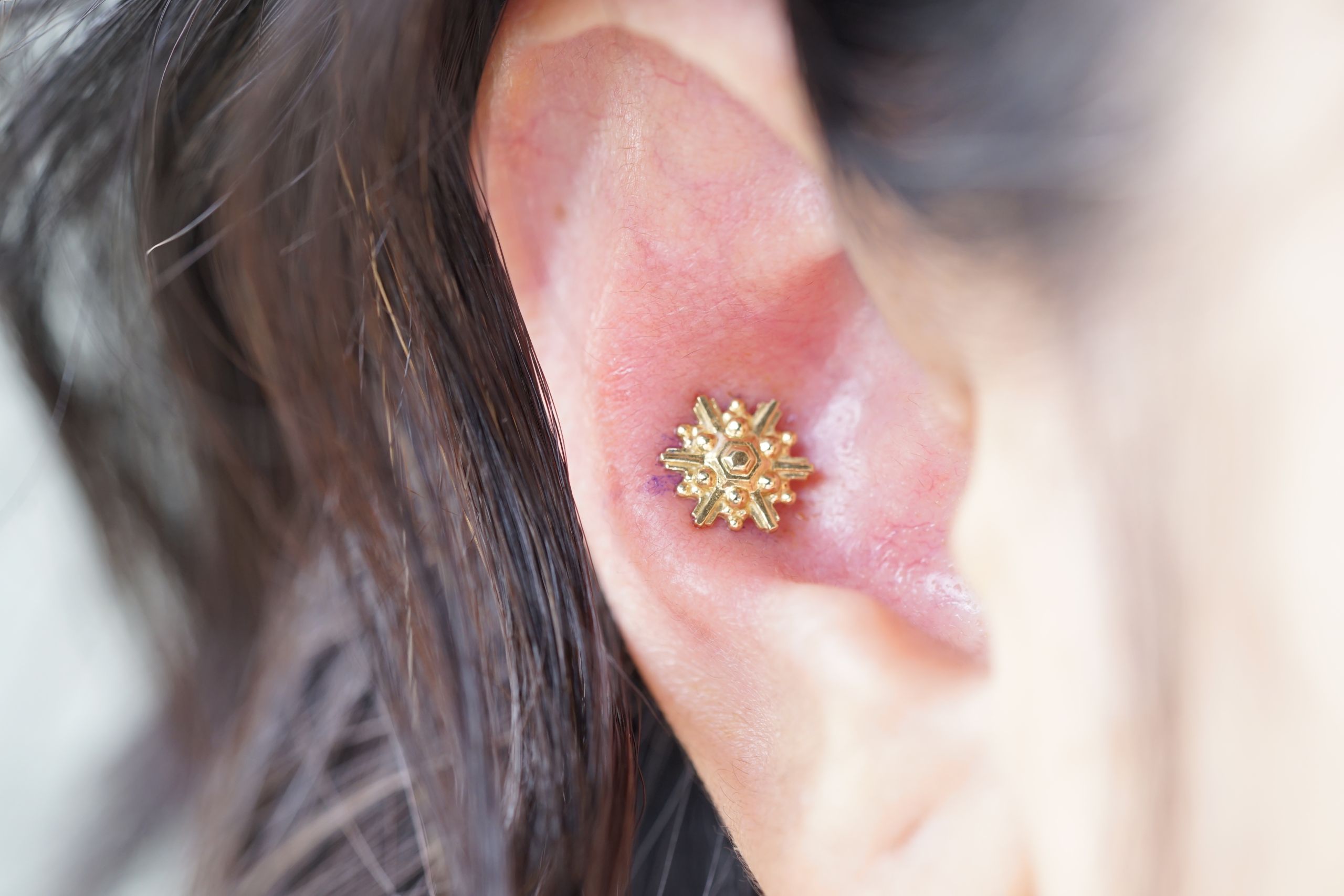 An example of a conch piercing An example of a conch piercing